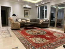 obývák s perským kobercem