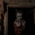 Joker schovávající se ve tmě.