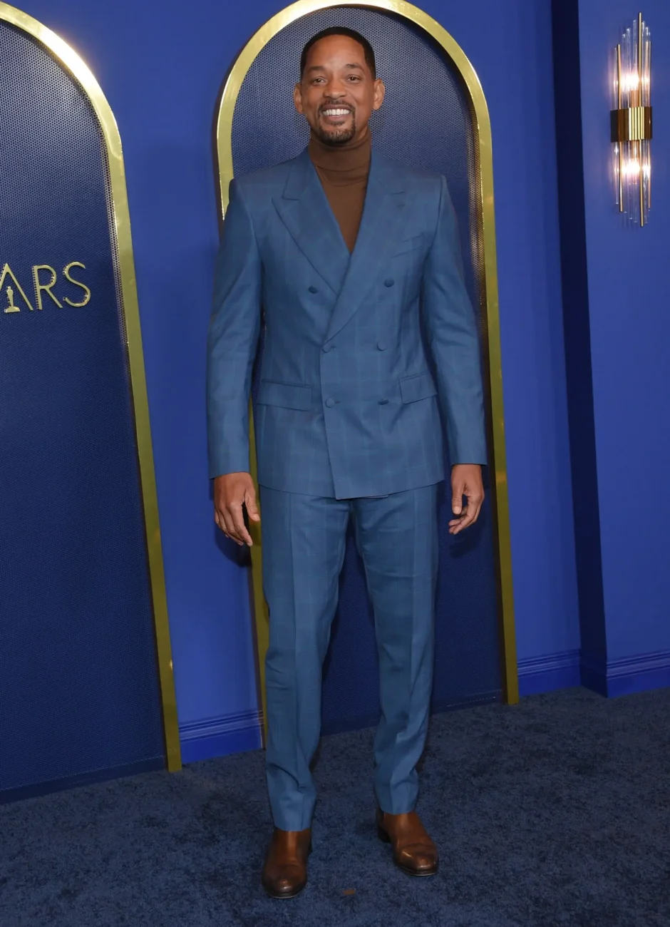 Will Smith se v posledním díle populárního filmu neobjevil. Zdroj: Shutterstock | TVGURU.cz Will Smith v modrém obleku.