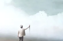 muž sahající na malbu umělého nebe