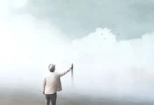 muž sahající na malbu umělého nebe