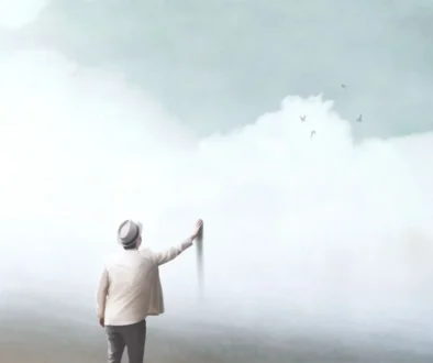 muž sahající na malbu umělého nebe