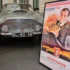 Auto a plakát k filmu Goldfinger.