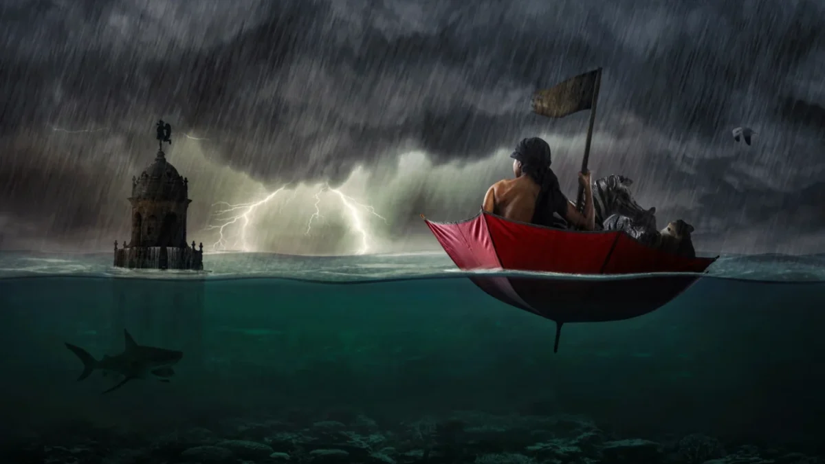 Žena se plaví v deštníku po vodě.