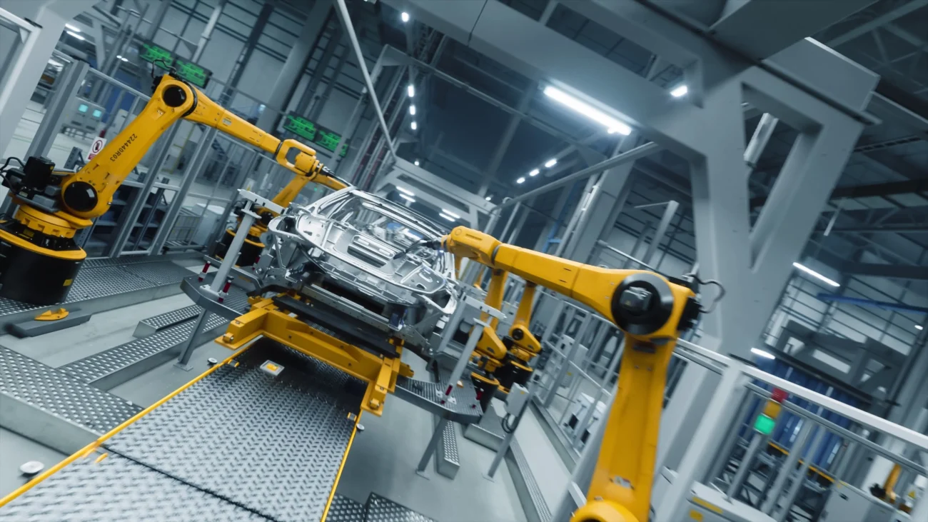 roboti držící auto