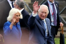 Britský král s manželkou.