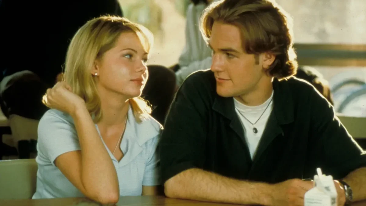 Muž a žena sedí u stolu.