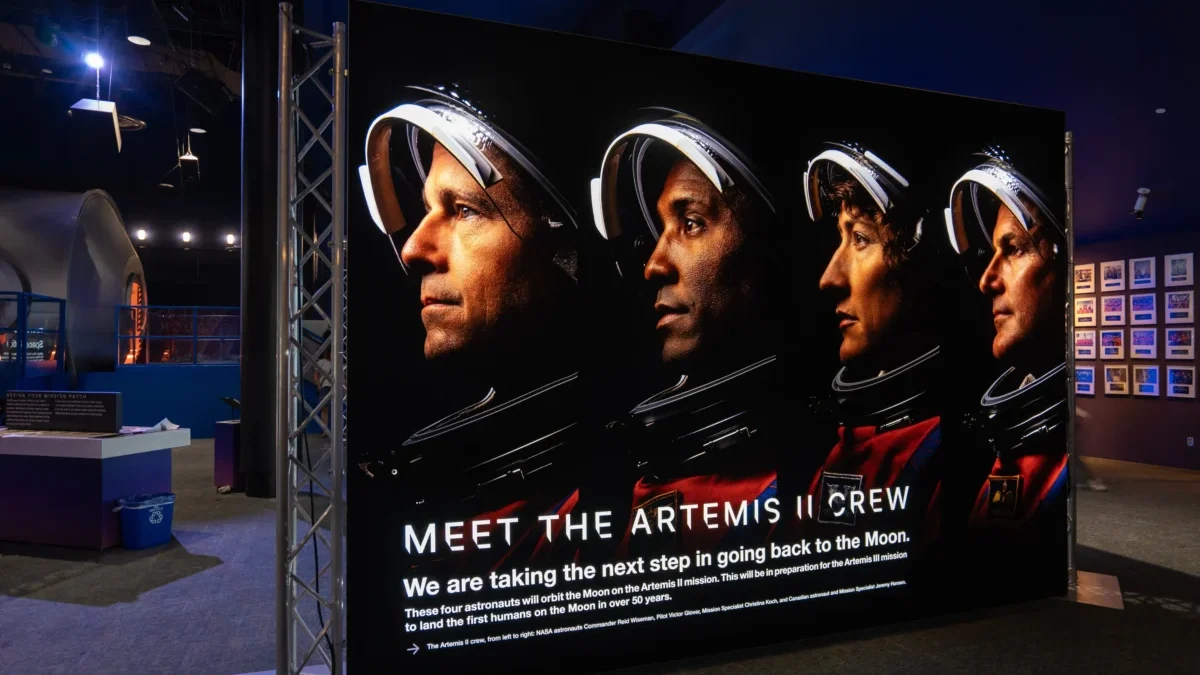 čtyři astronauti na plakátu