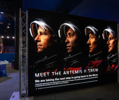 čtyři astronauti na plakátu