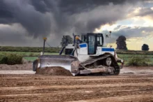 Buldozer na poli