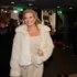 Lucie Borhyová se usmívá ve večerní róbě.