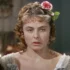 Žena s květinou ve vlasech