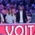 muži a ženy za pultem s nápisem Vojta