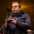 Václav Moravec mluví do mikrofonu.
