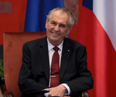 Miloš Zeman se směje.