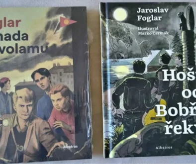 Two vintage Czech adventure paperbacks laid on a surface; left cover shows a group of boys under a cloudy sky with the title Foglar Záhada hlavolamu, right cover titled Hoši od Bobří řeky with a moonlit jungle scene.